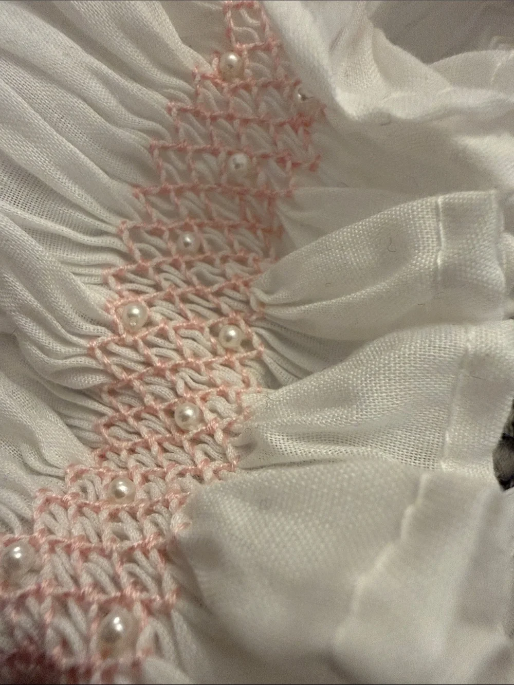 White Smocked Baby Bonnet with Pink Detail
